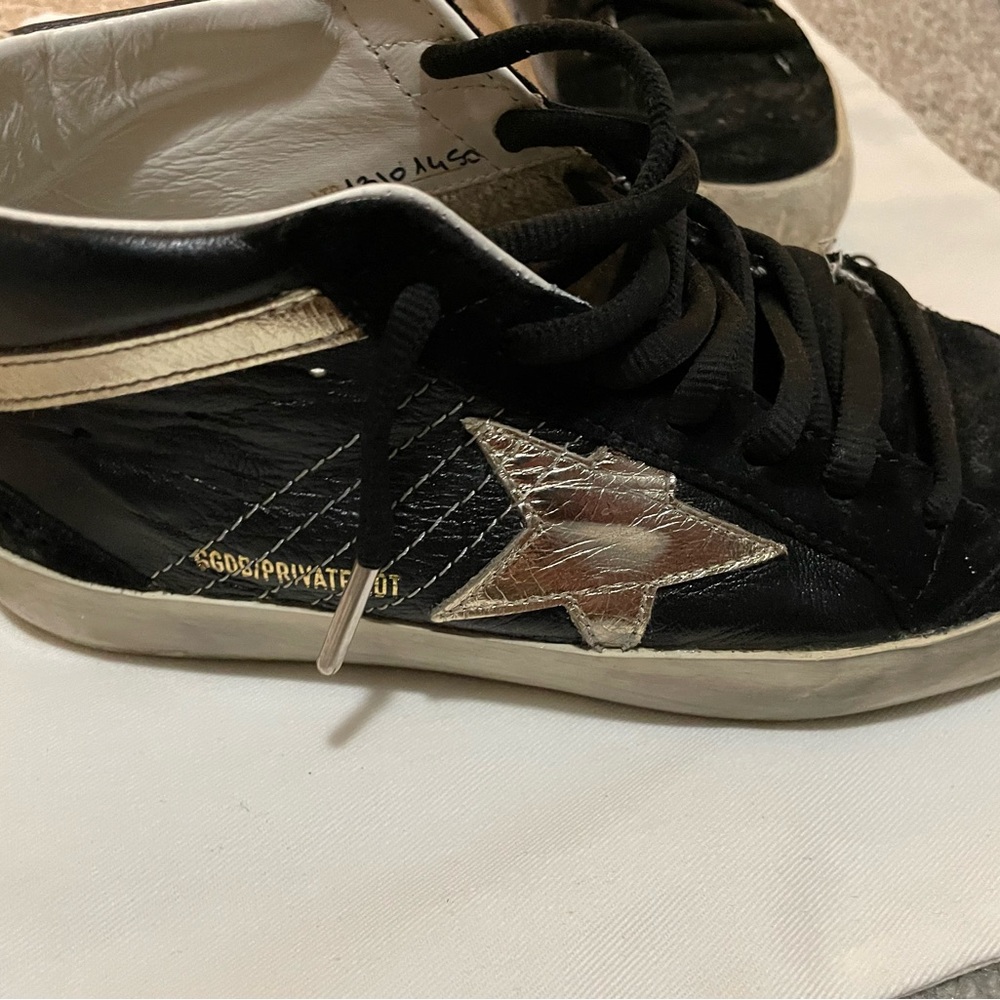 Golden goose black and gold